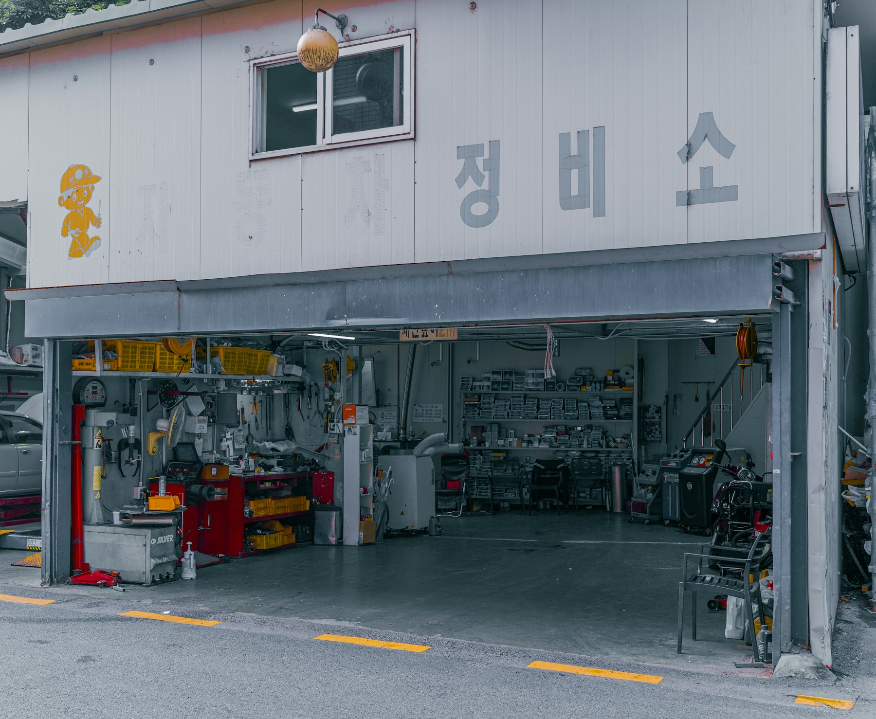 믿음모터스 정비소 입구